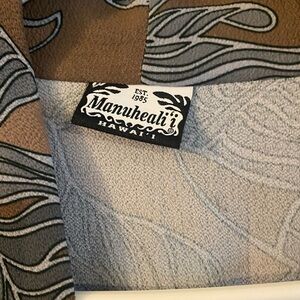 Manuhealii Brown and Gray Patterned Fabric